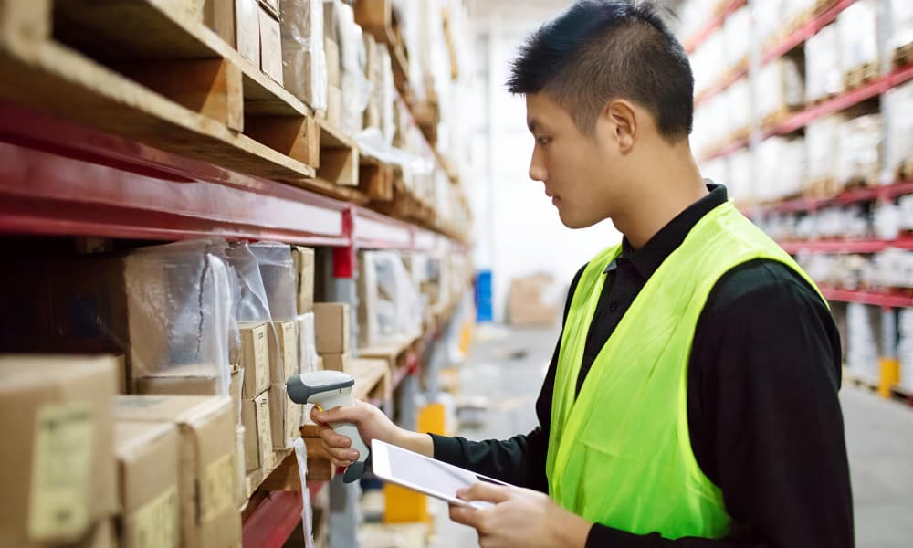 Warehouse personnel scanning items