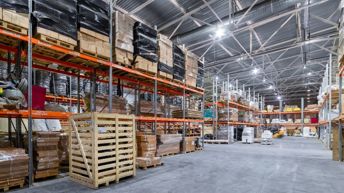 warehouse with towering industrial shelving units